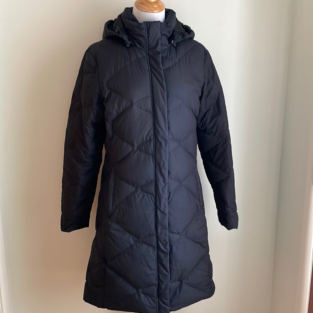 WOMEN’S The North Face knee length, black parka.